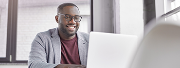 African American man reviewing Healthcare information on myAvatar 