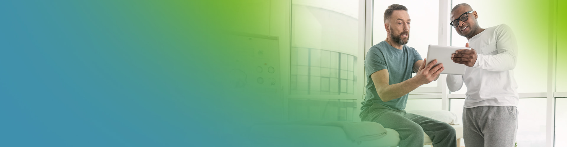 home health provider with patient tablet