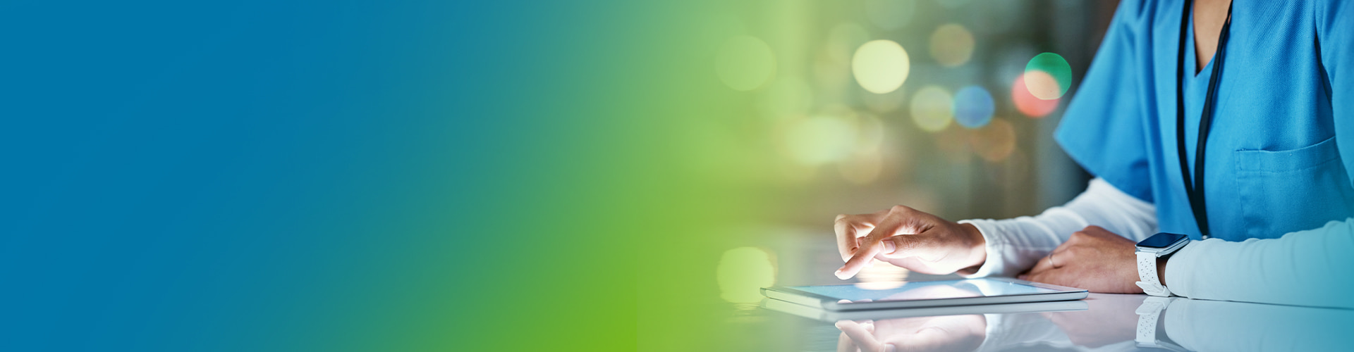 Healthcare nurse with tablet | Netsmart